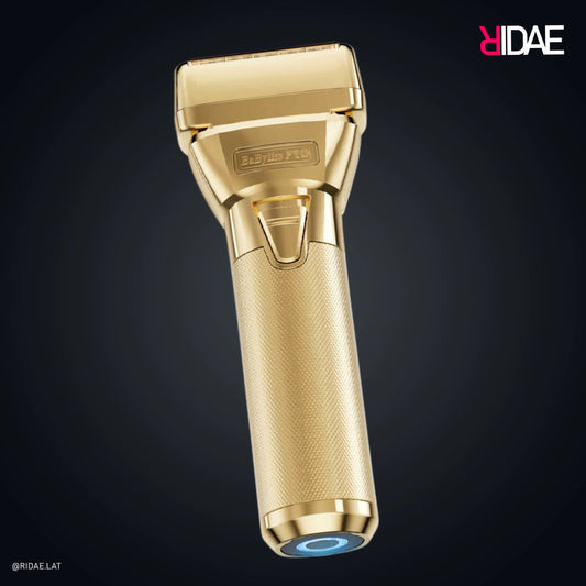 Afeitadora dorada BaBylissPRO FXONE GoldFX FX79FSG con batería intercambiable y doble hoja de titanio.